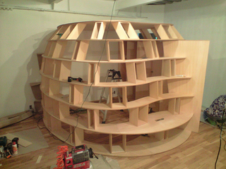 Illustration for article titled Build Your Own Bookcase Fort: Settle in for a Nerdy Siege
